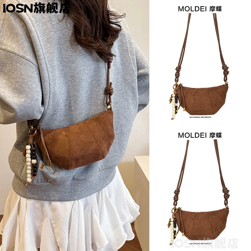 IOSN秋冬季高级感通勤小众手机斜挎小包包女2025新款潮豹纹棕色牛