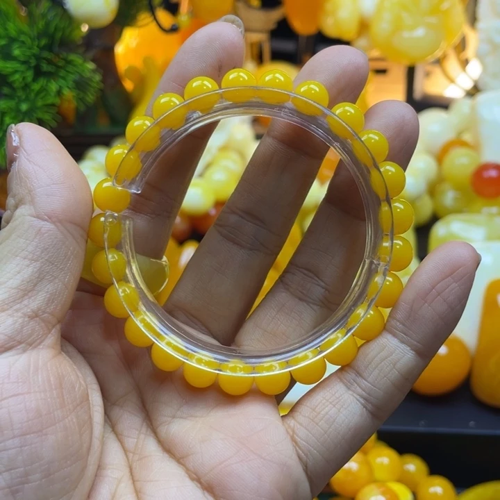 *****树脂非金属全品无瑕鸡油黄8精品手串
