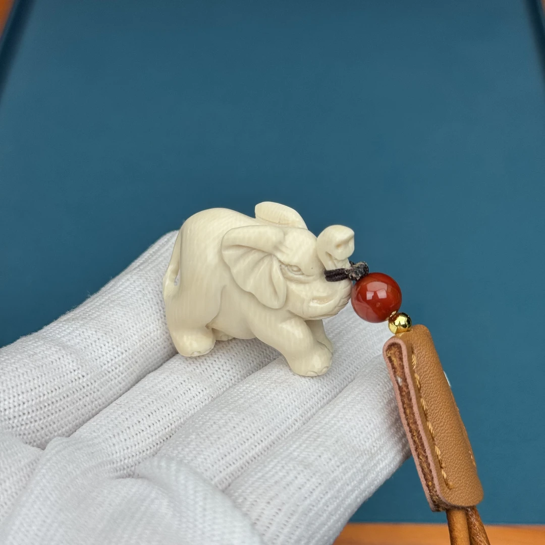 H87-84天然猛犸牙 雕刻小象34*25*16mm支持鉴定 假一罚四