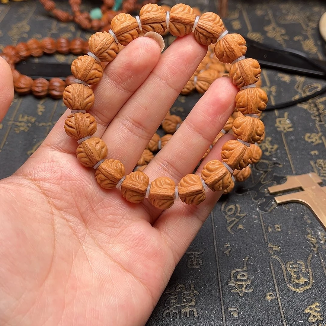 桃核吊坠小金豆手串