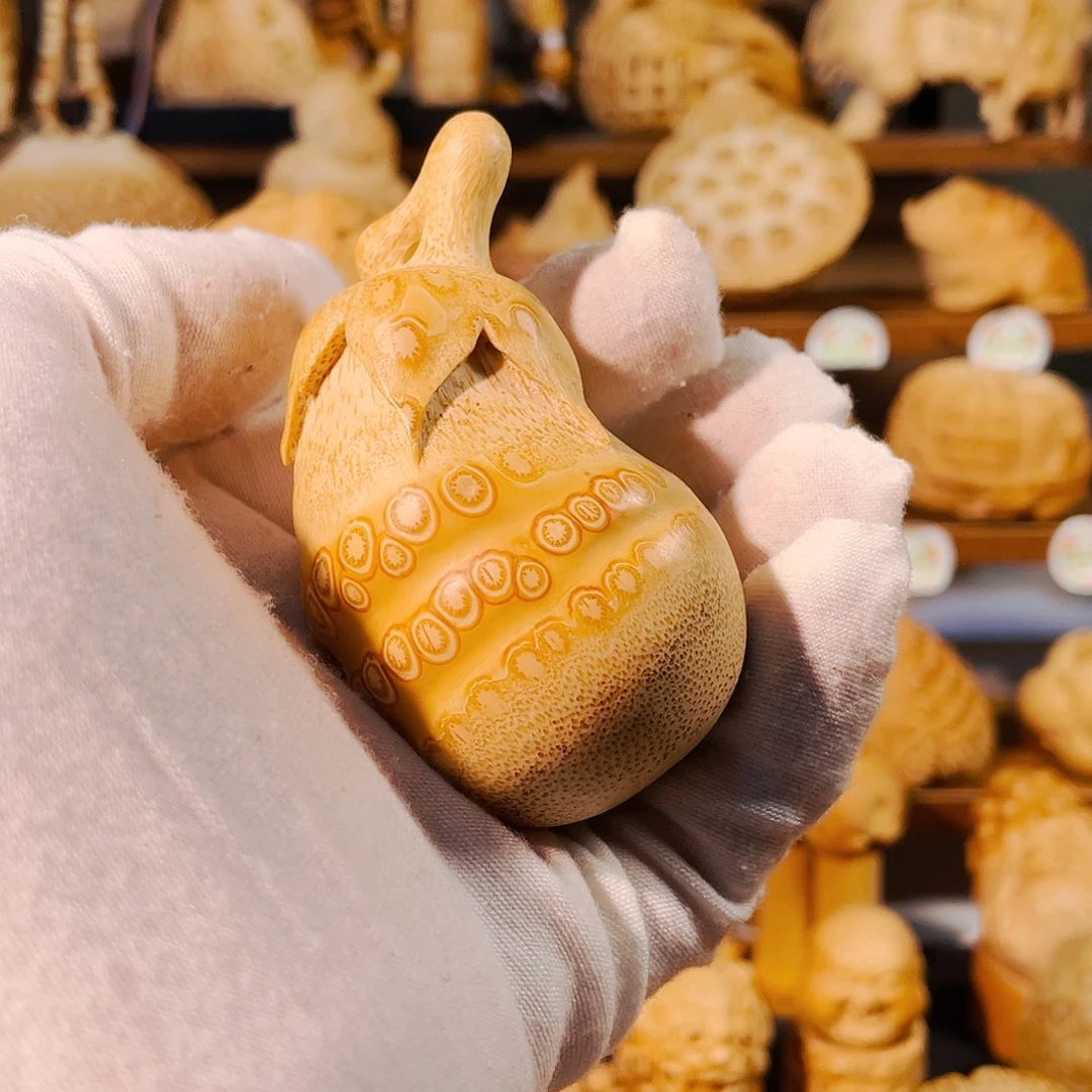 竹竹根雕茄子把玩件