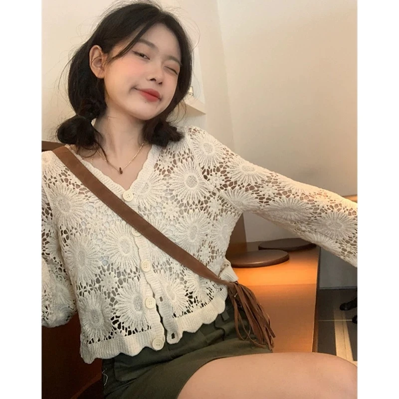 【秀宝女装】设计款百搭镂空流苏针织衫XB4373