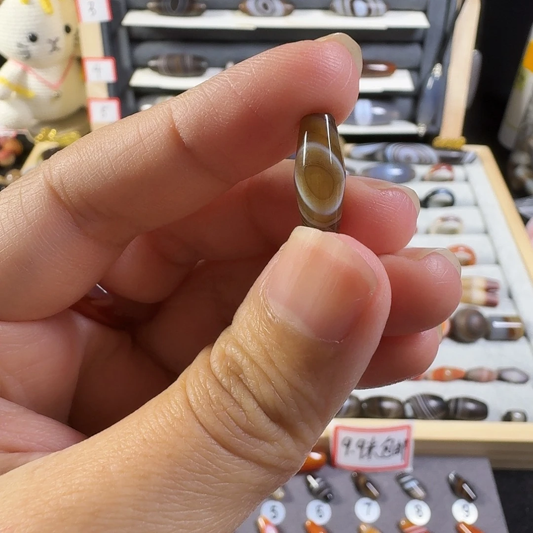 琉璃非金属咖色小橄榄直径6对孔15