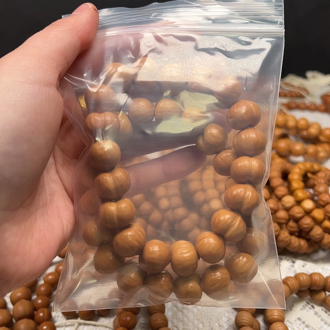 太****吊坠猴头核桃瑕疵屁桃手串