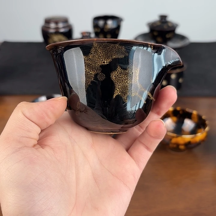 瓷洒彩鹧鸪斑椭圆公道杯