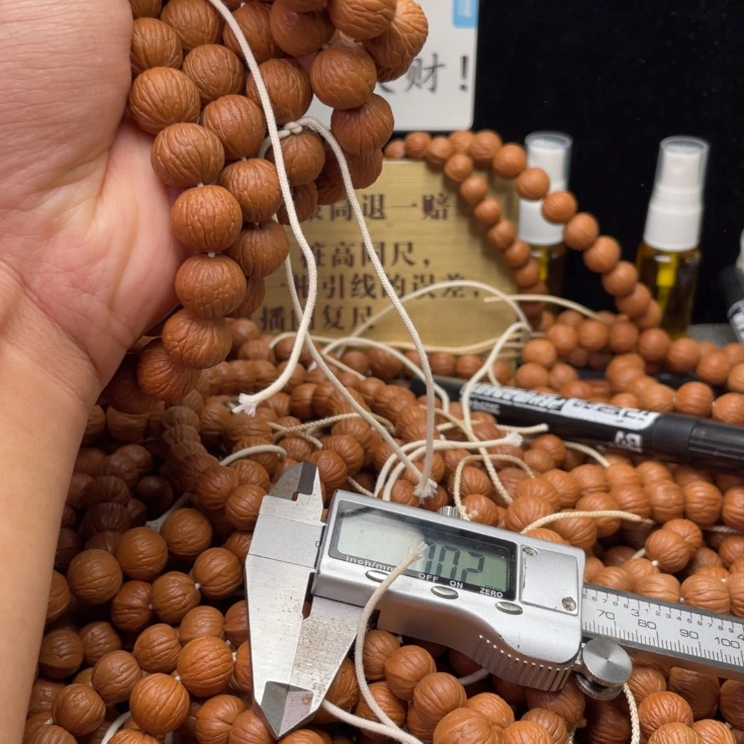 吊坠猴头核桃凤羽手持