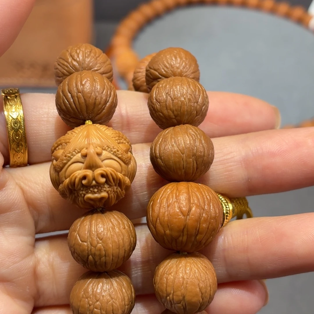 吊坠桃核13双圈凤羽