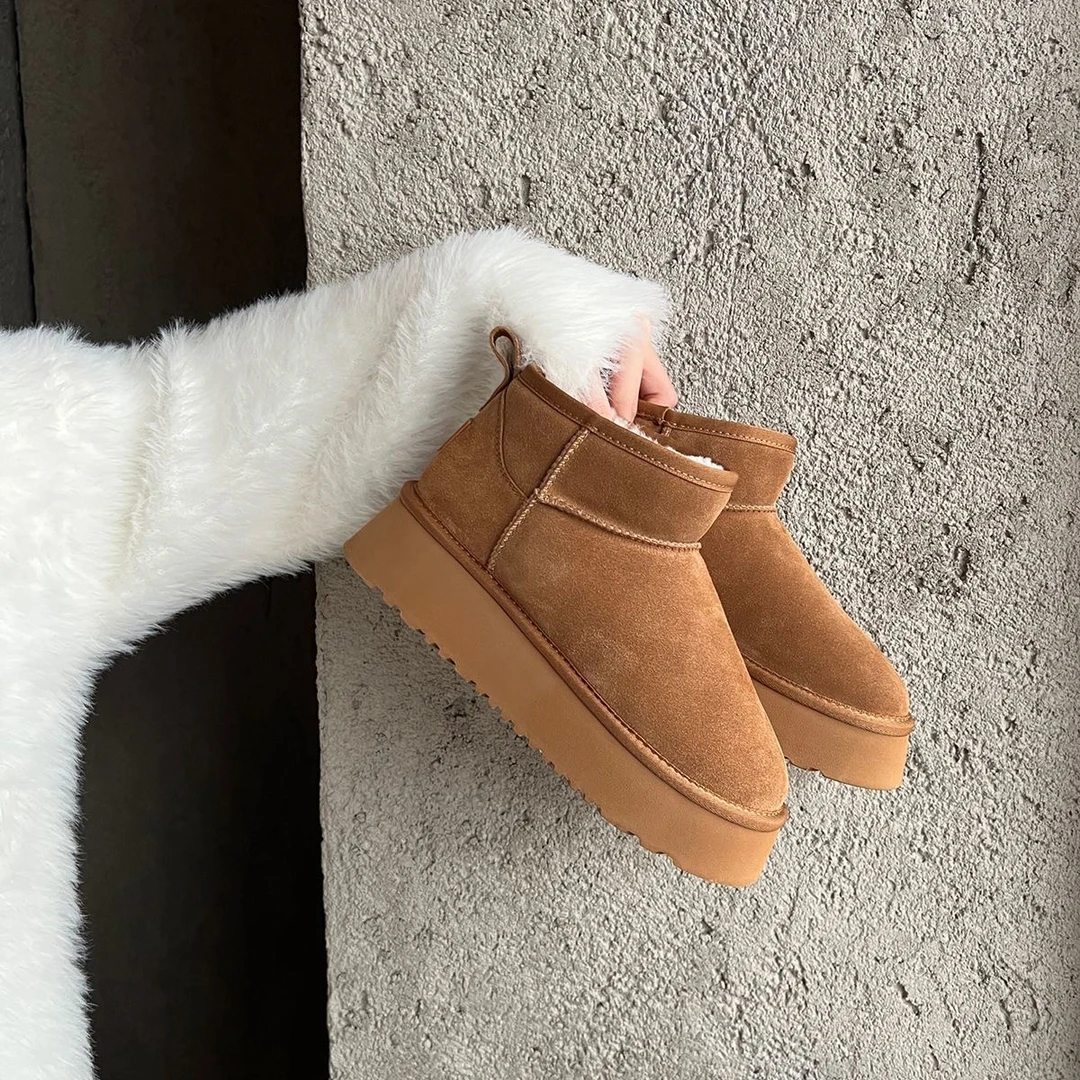 斐又皮毛一体牛皮羊毛雪地靴周冬雨同款短筒厚底防滑雪地靴F6699