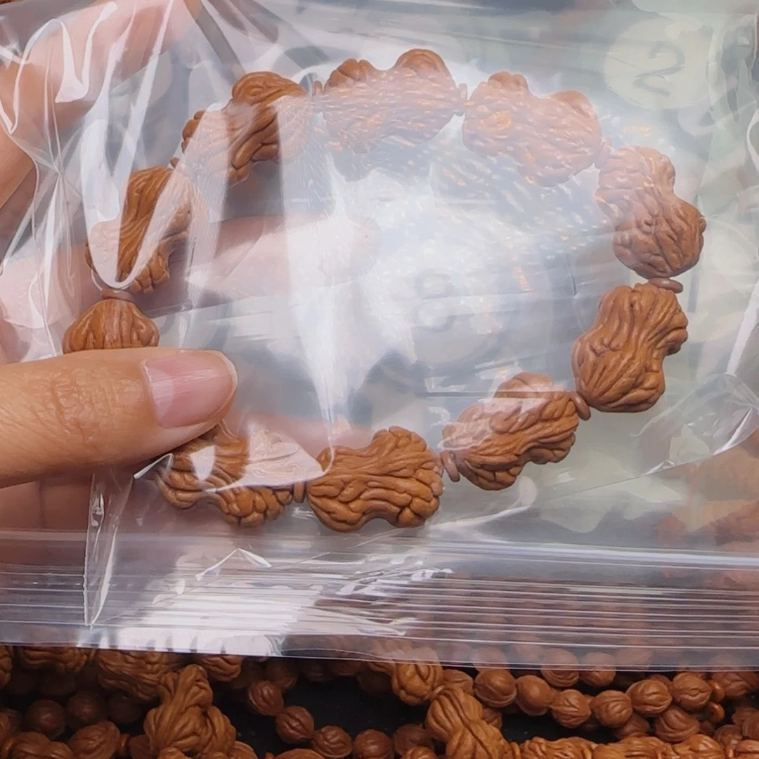 陈***龙桃核手串龙纹桃核