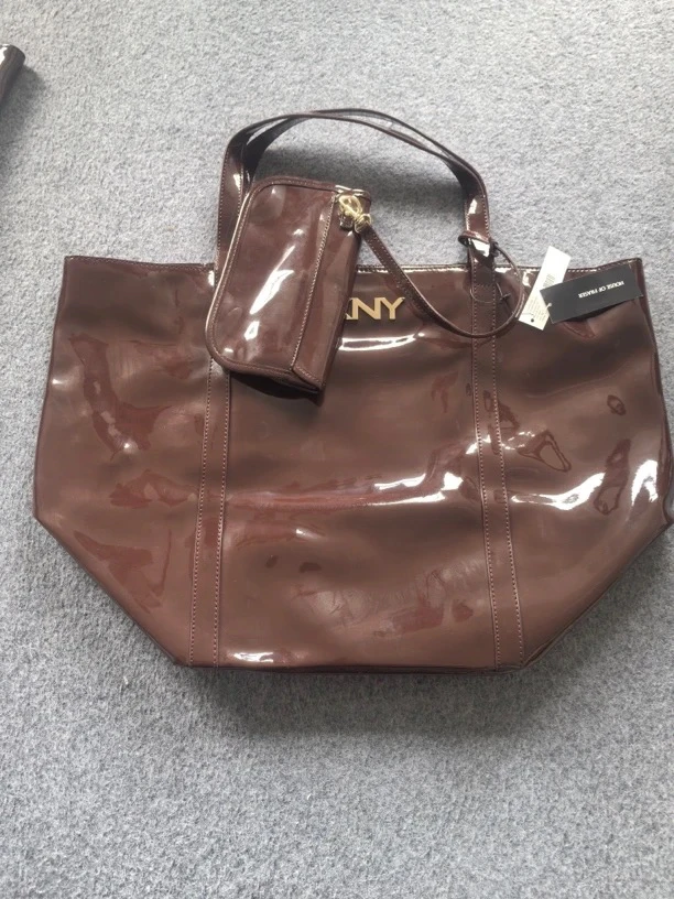 《辉岳》大号约35*25*50 棕色手提包发1瑕疵