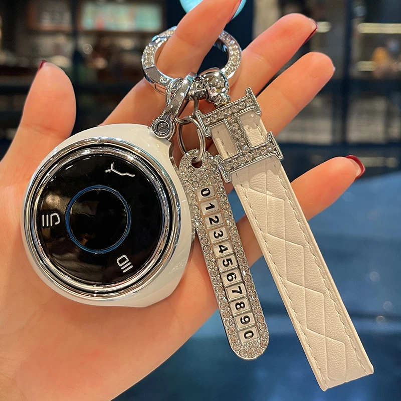 哪吒UPro钥匙套哪吒V钥匙套哪咤新能源半包款可旋转保护壳扣高档