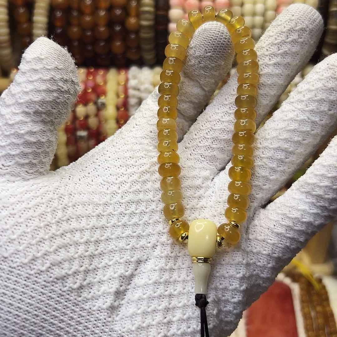 桃核把件0.9冰花羊角