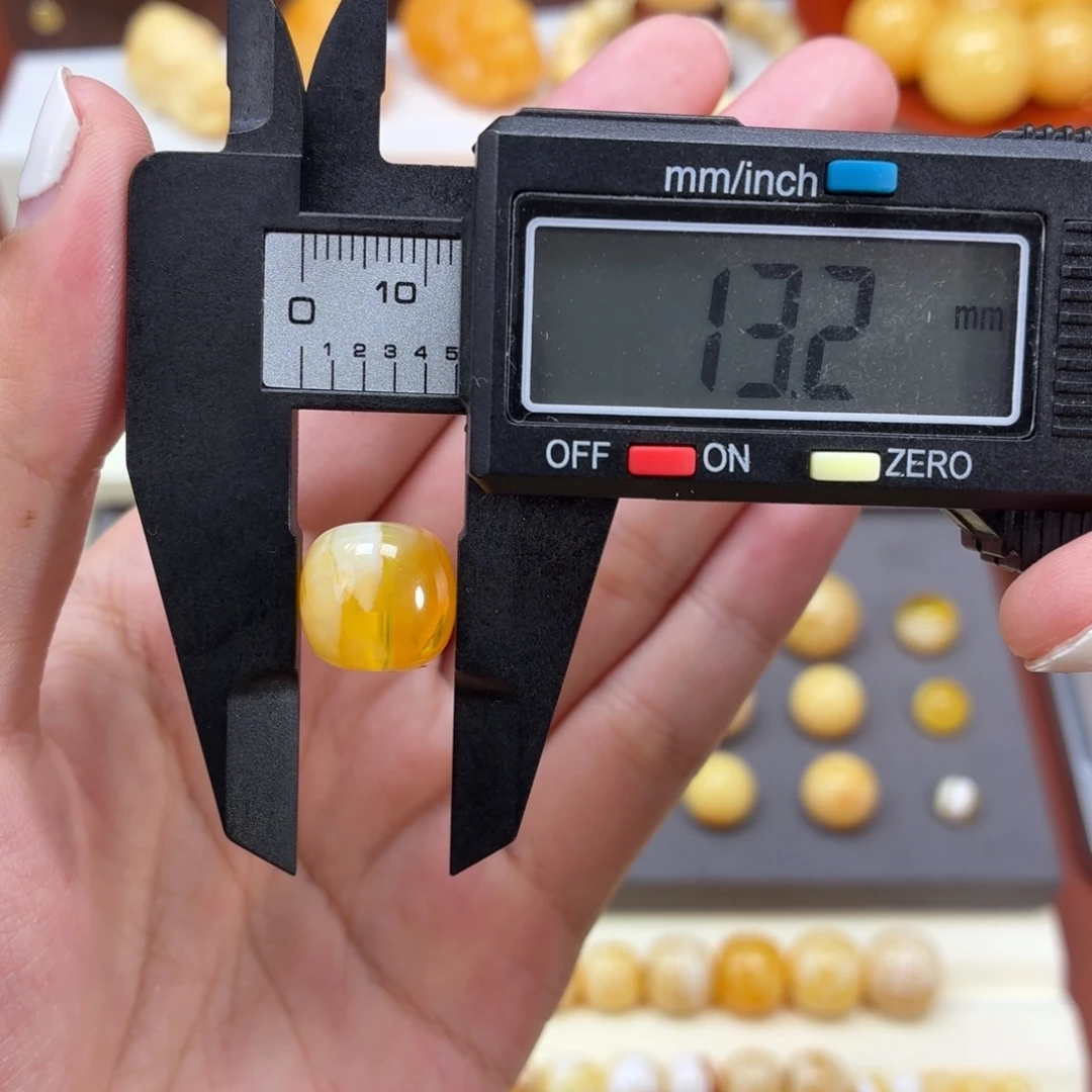 琥珀未镶嵌珠宝奇石焦皮金橘白溶洞老型13mm