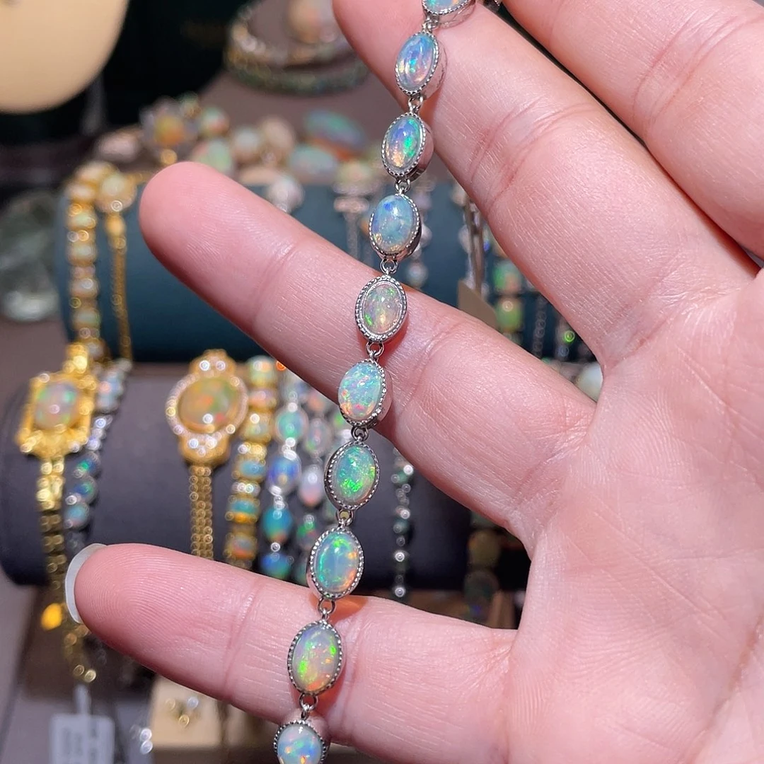 银S925镶嵌欧泊手链）奥****?