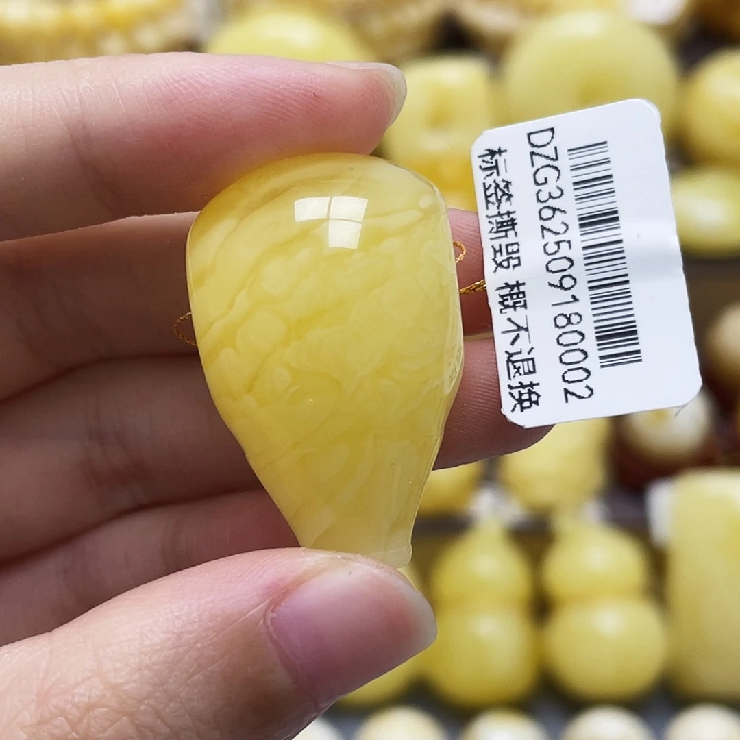 琥珀未镶嵌裸石20*31.7mm溶洞虎皮三通微瑕