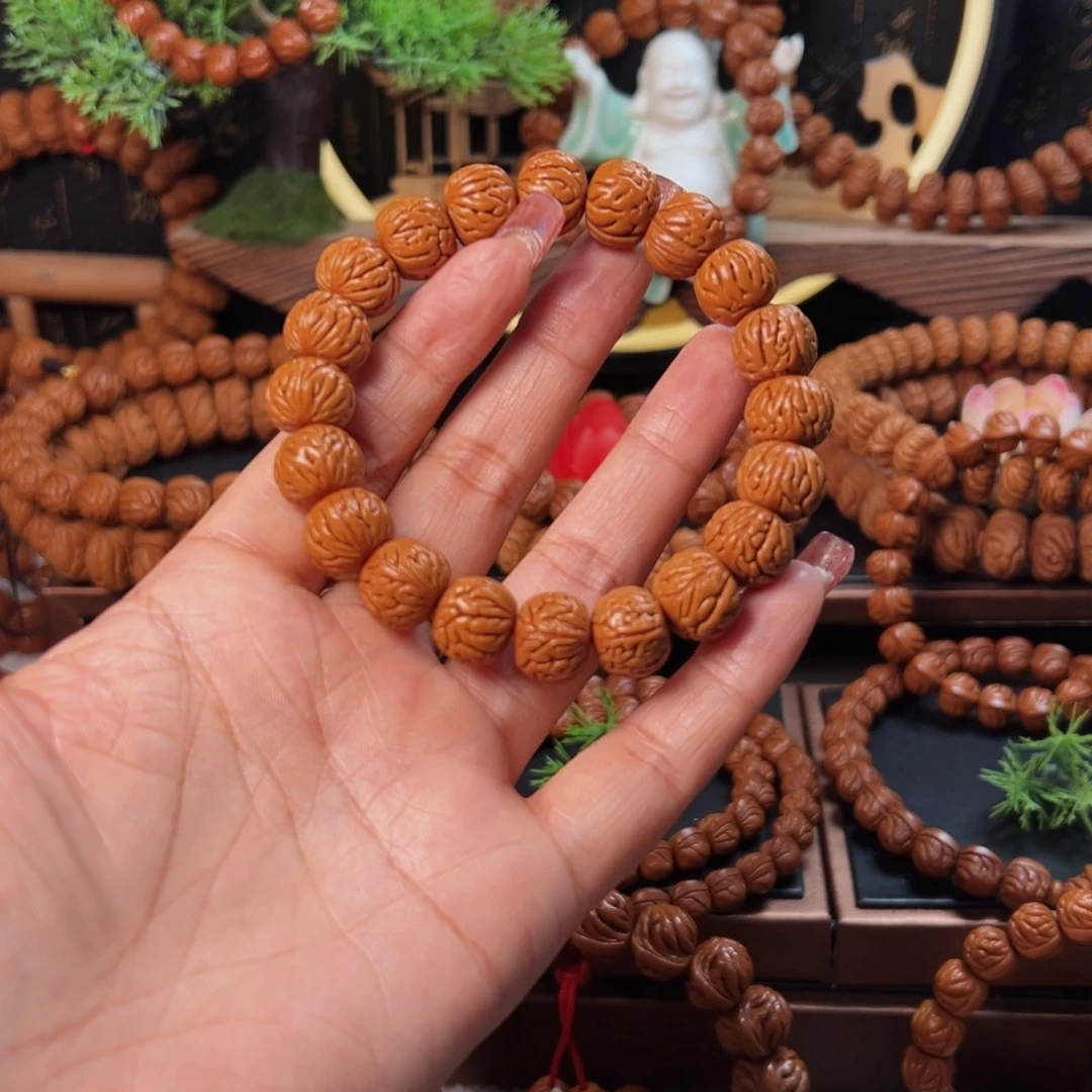 桃核手串14野生龙纹凤羽单圈