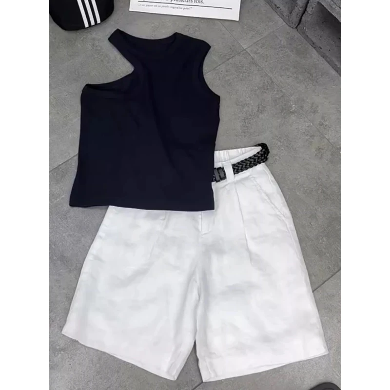 多巴胺早秋衣服新款高级别致独特气质小个子通勤黑色背心短裤套