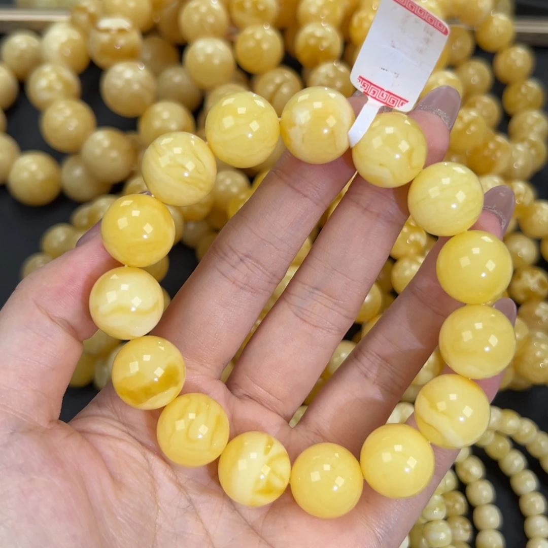 琥珀未镶嵌手链32.6黄白妖花