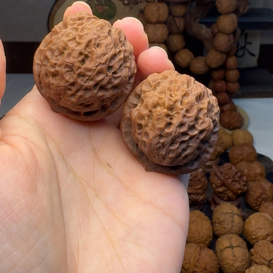 沈***美文玩核桃把件七彩绣球34.8  边35.3