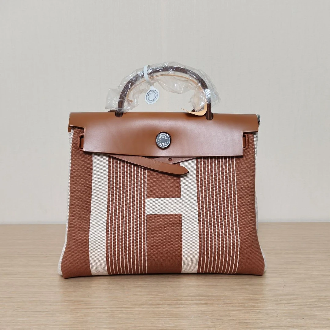 99新 Hermes/爱马仕 小花6枫Herbag 31 米色拼黄褐色 D刻 银扣包