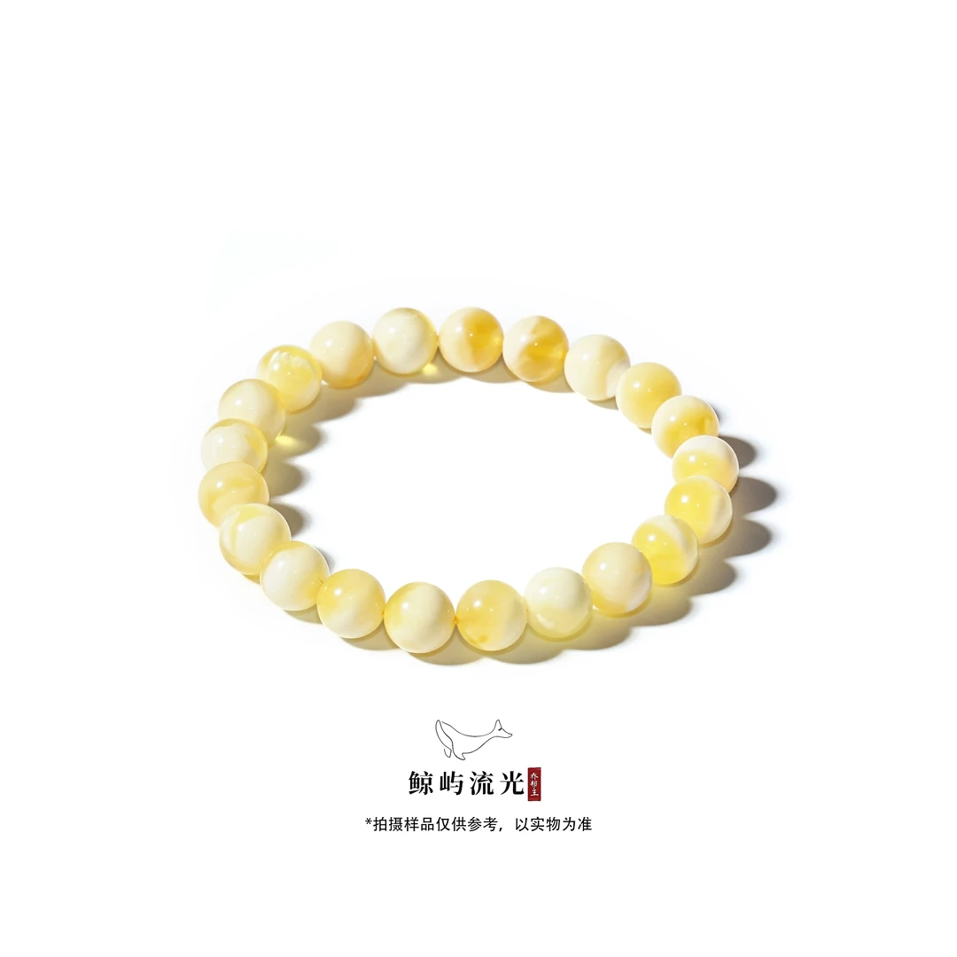 14翎光金瓷白蜜蜡手串多样性发其一