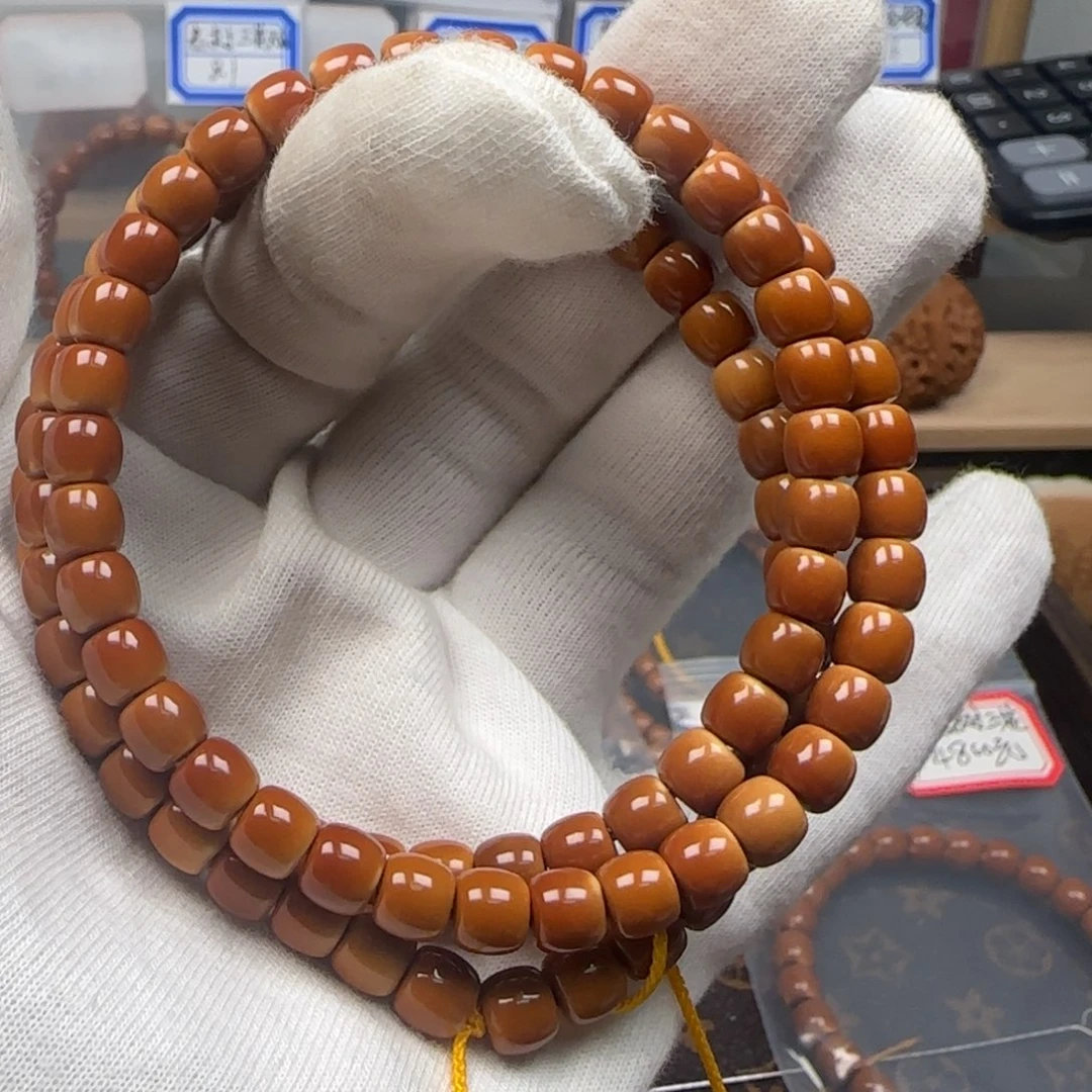 橄榄核手串老挝长串极限弧正三花6.6mm