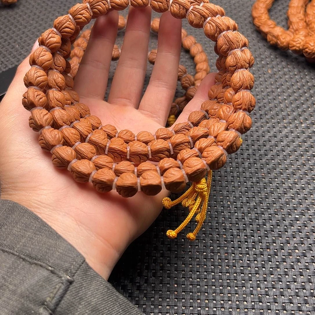 桃核吊坠小龙纹手持