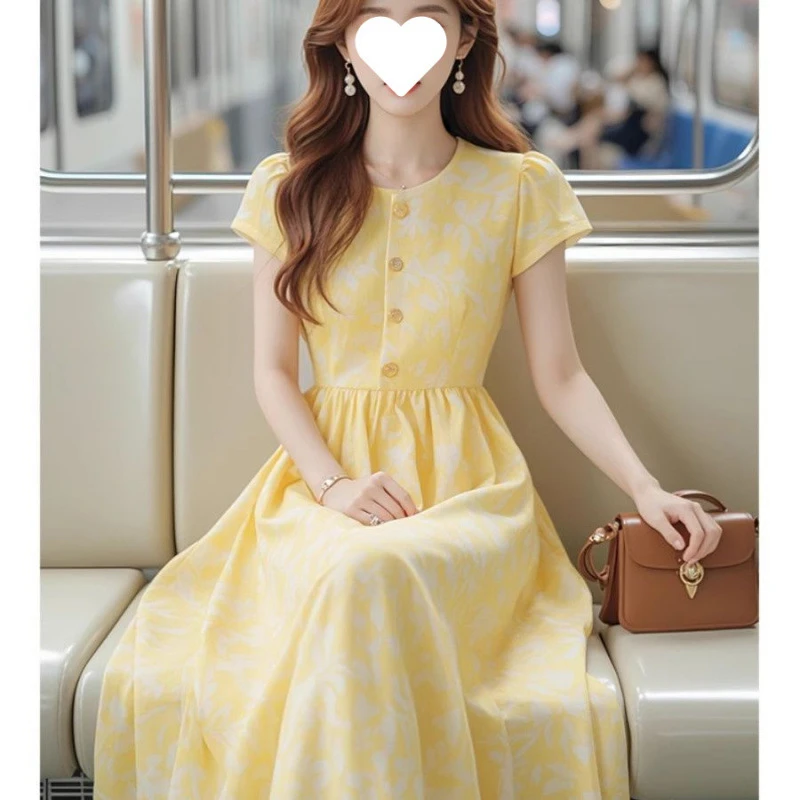 今年流行的法式赫本轻熟风长裙气质黄色印花收腰显