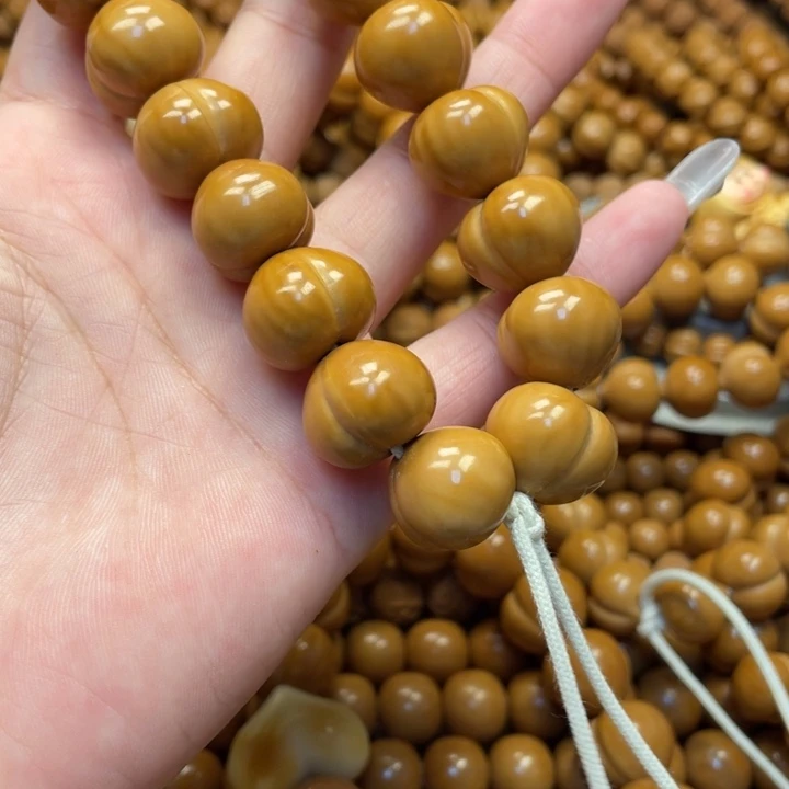 用****核桃微瑕亮面屁桃手持加爱心