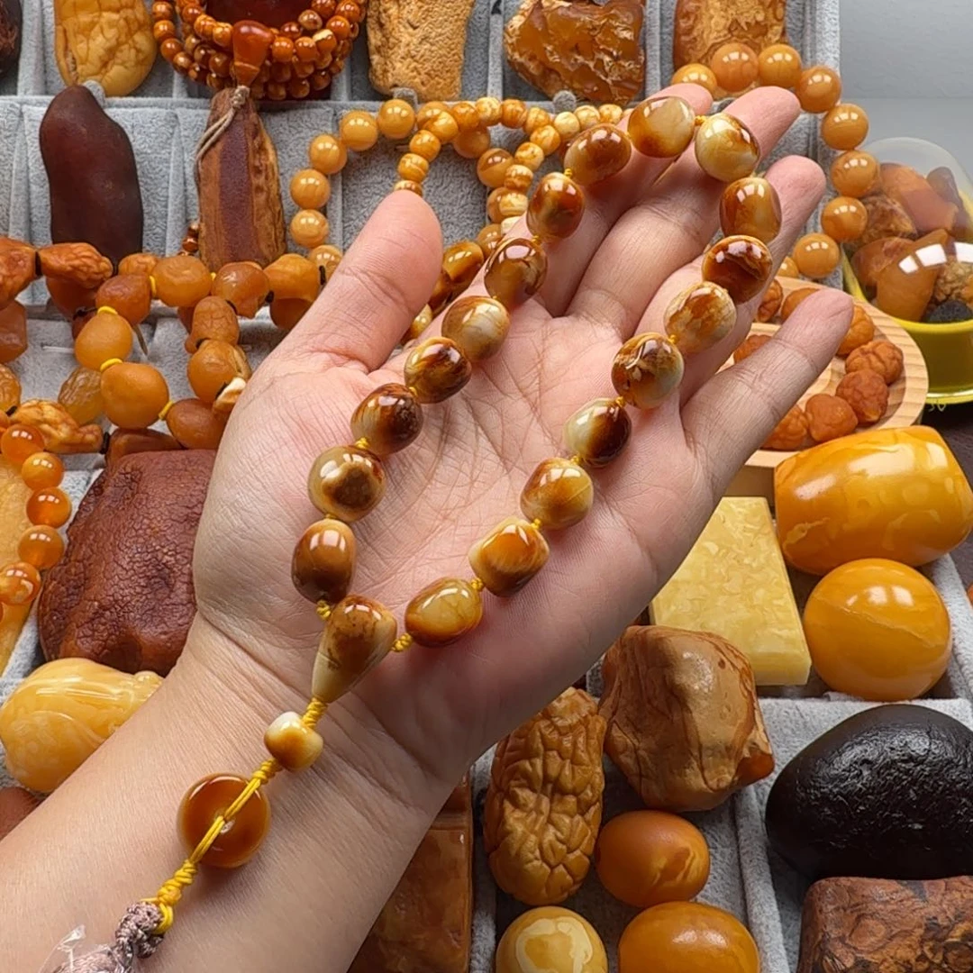 琥珀未镶嵌裸石花蜡手持