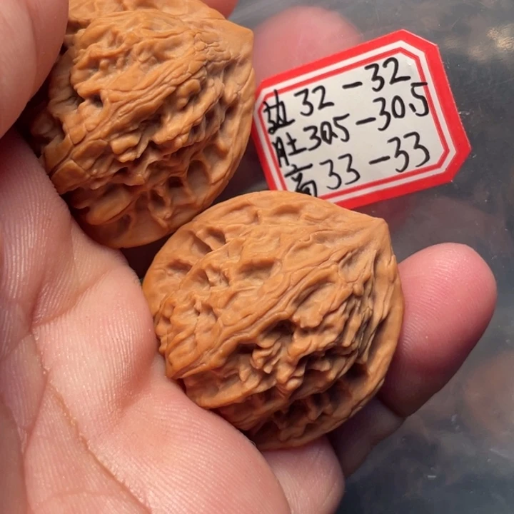 桃核吊坠十字岭鸡心