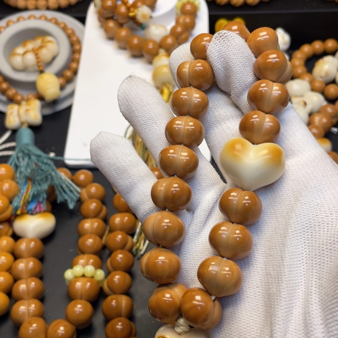 霍***茹猴头核桃吊坠全品屁桃