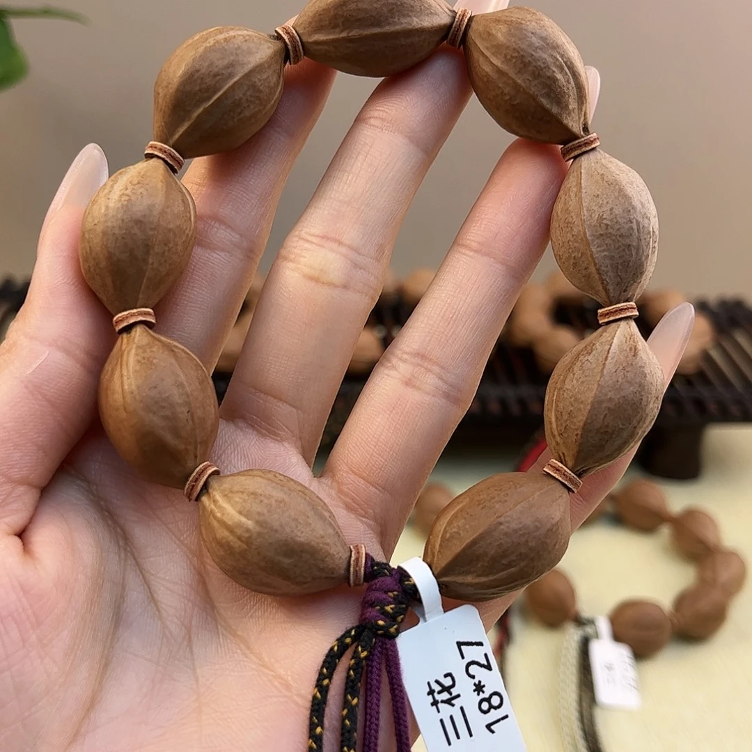 橄榄核吊坠梅林铁核文玩手串