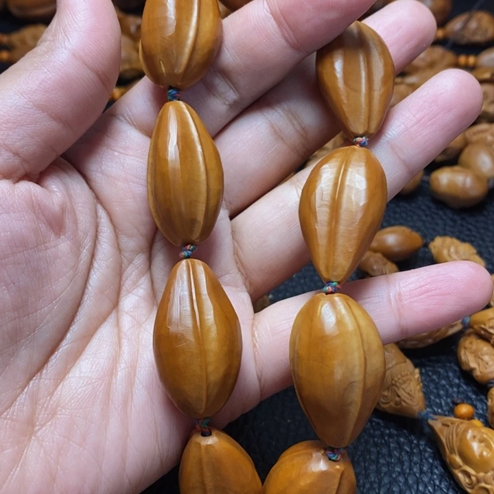 有***说橄榄核吊坠橄榄核