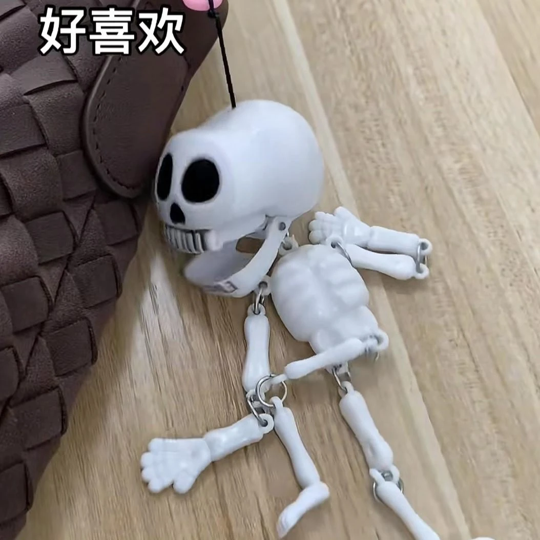 拉下会动骷髅头挂件钥匙扣包包搞怪趣味整蛊趣味搞笑钥匙扣礼物