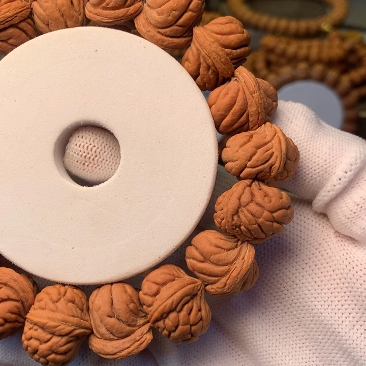 夕***晴桃核手串秦岭龙纹