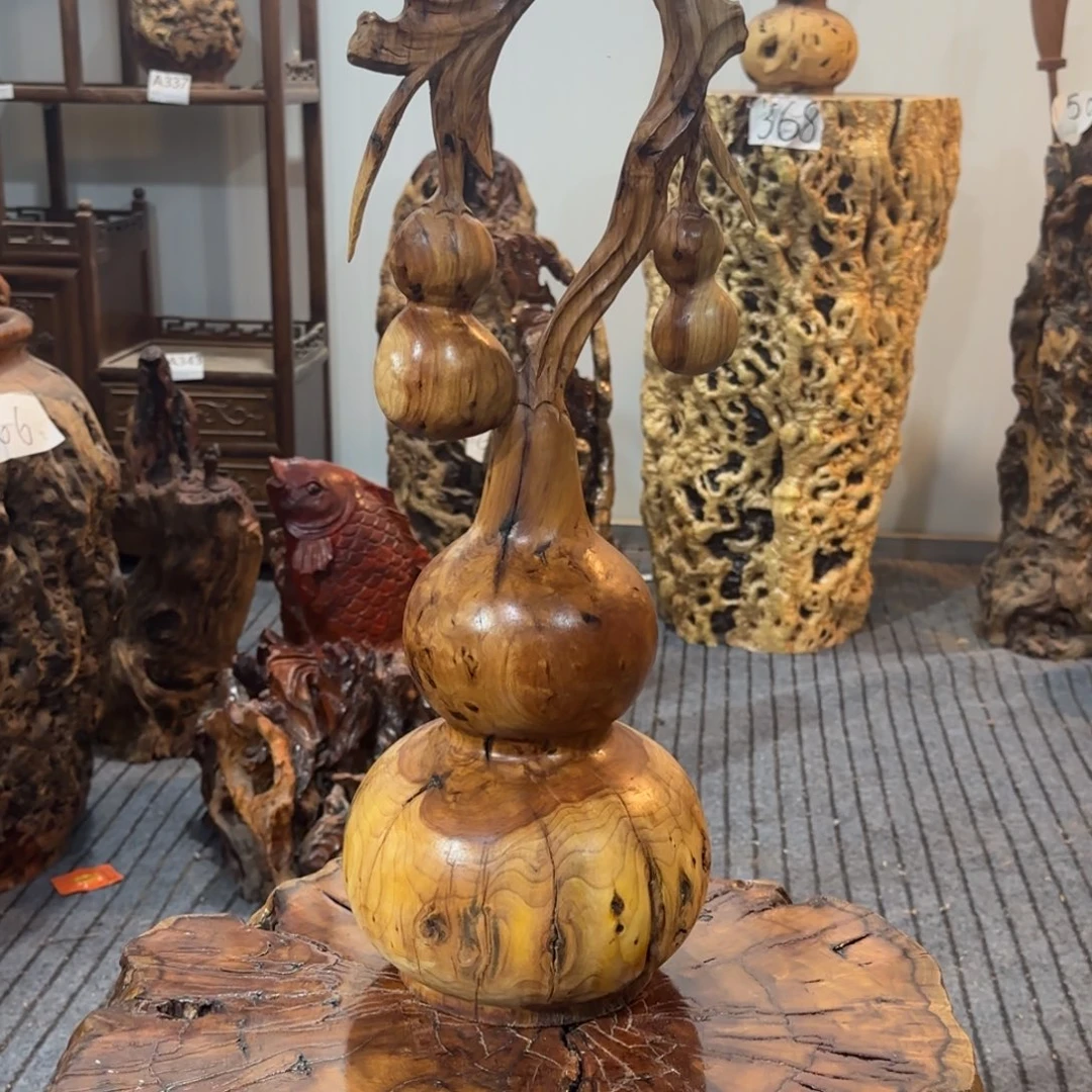 杨***生龙纹鸡心枣木手工艺品