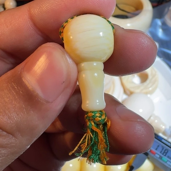 钦***诺吊坠菩提根/象牙果