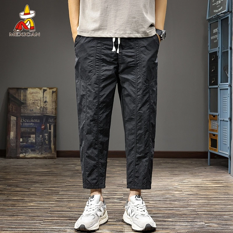Mexican/稻草人夏季薄款男士休闲裤日系潮牌宽松八分九分哈伦裤子