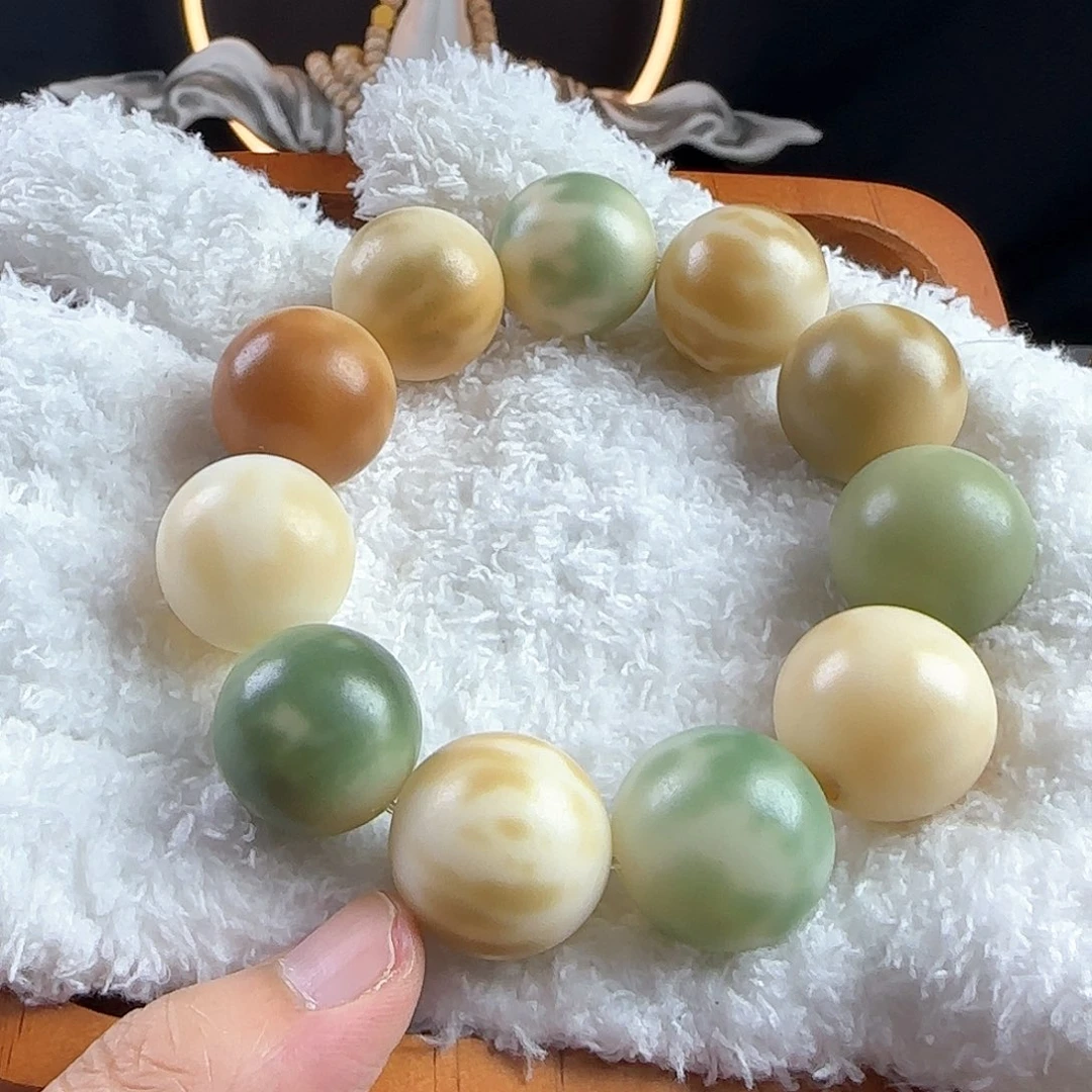 菩提根/象牙果手串龙*瑕疵卡23手串一条