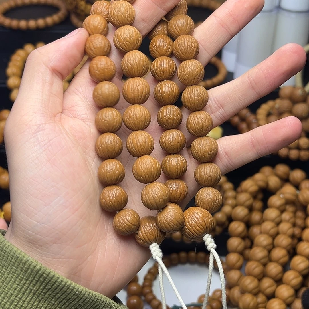 .***。吊坠猴头核桃三维凤羽