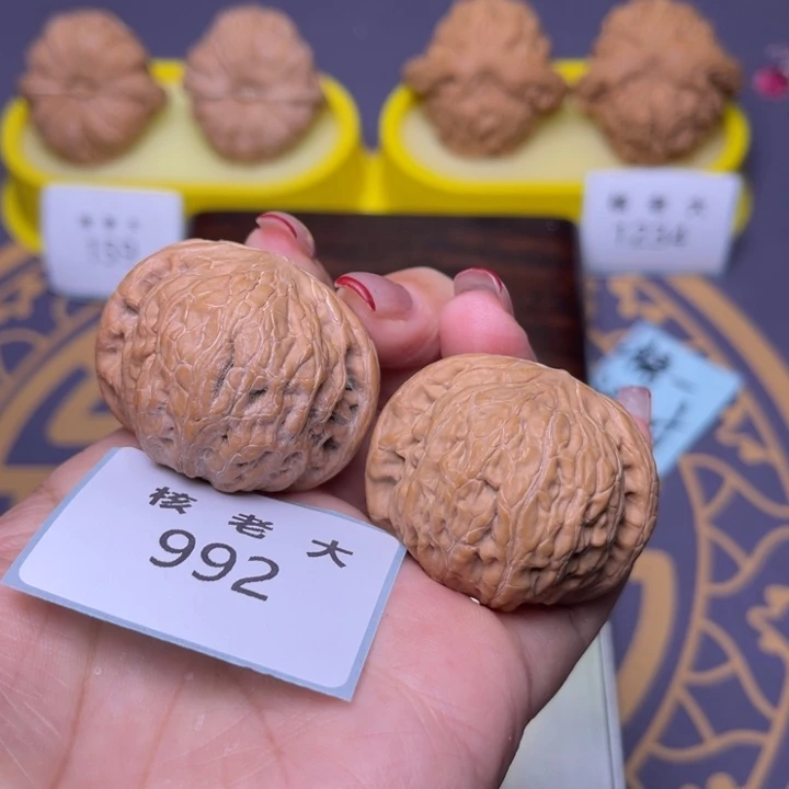 刘***革文玩核桃把件铁锤39.992