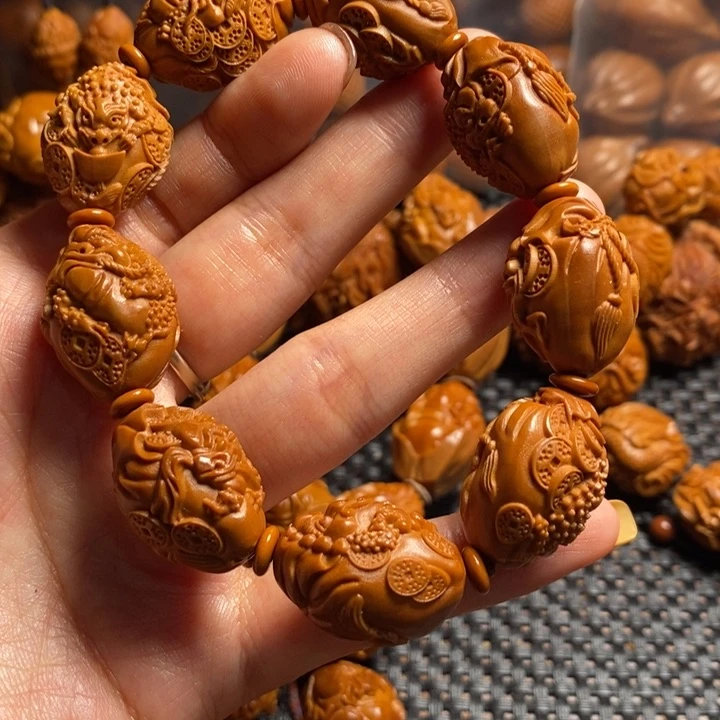 橄榄核吊坠金蟾手串