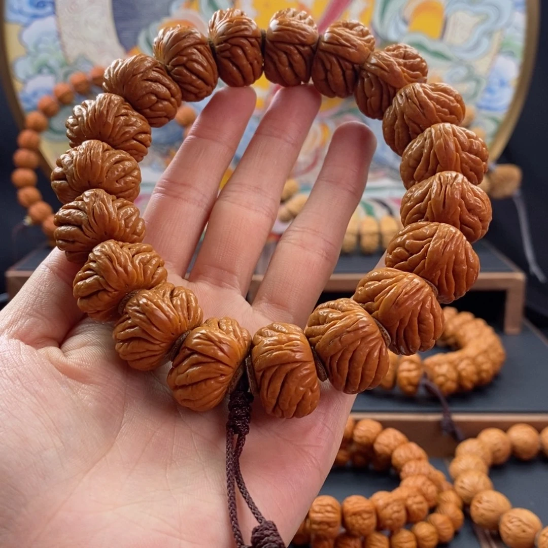 桃核手串龙纹桃核麒麟