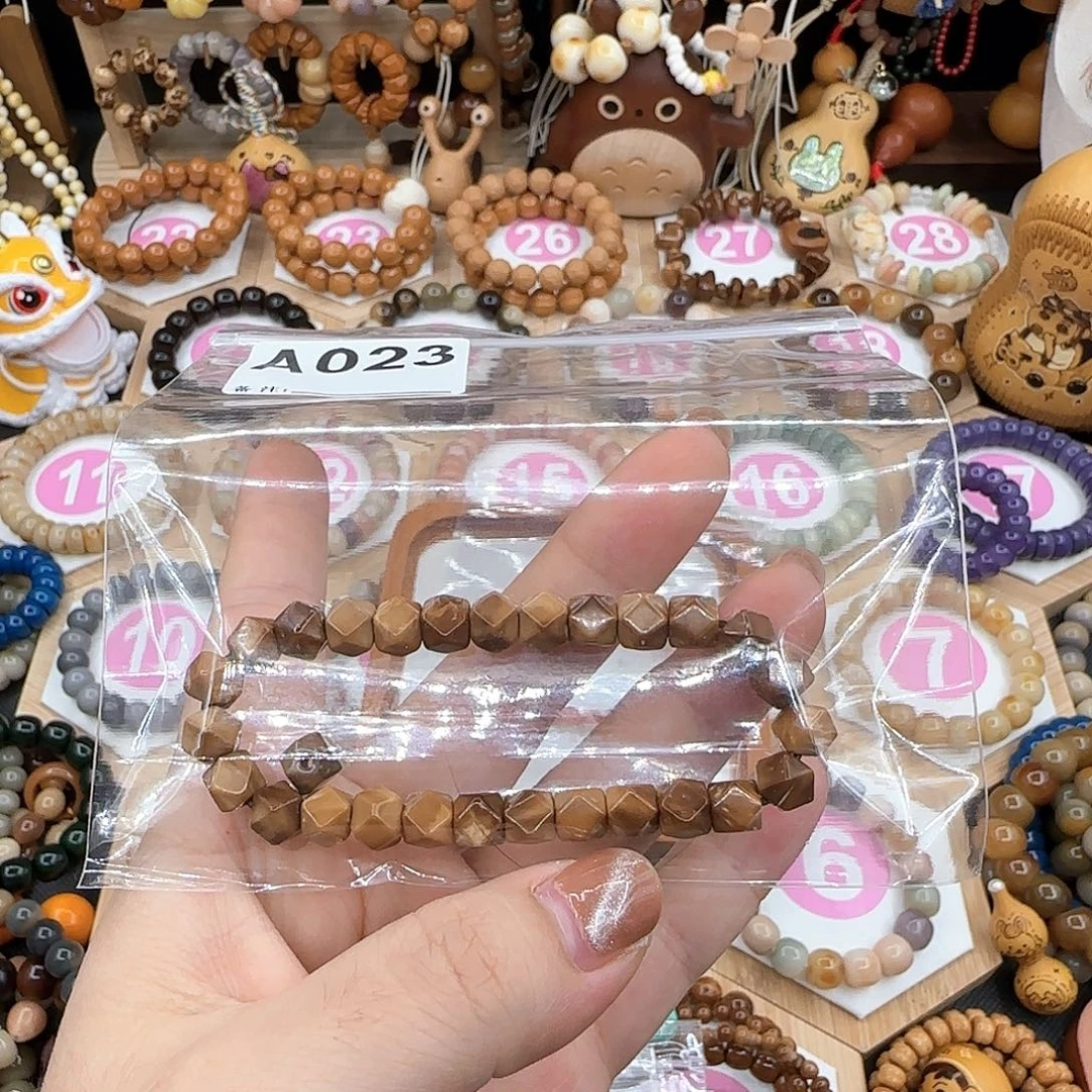 郑***诶吊坠菩提根/象牙果