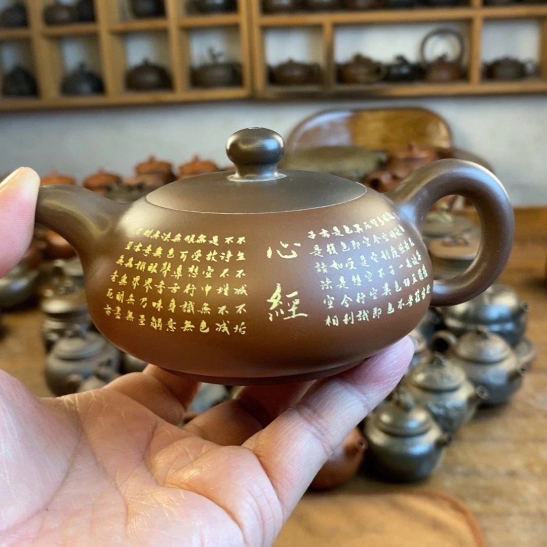 覃***肉坭兴陶茶壶……………茶壶