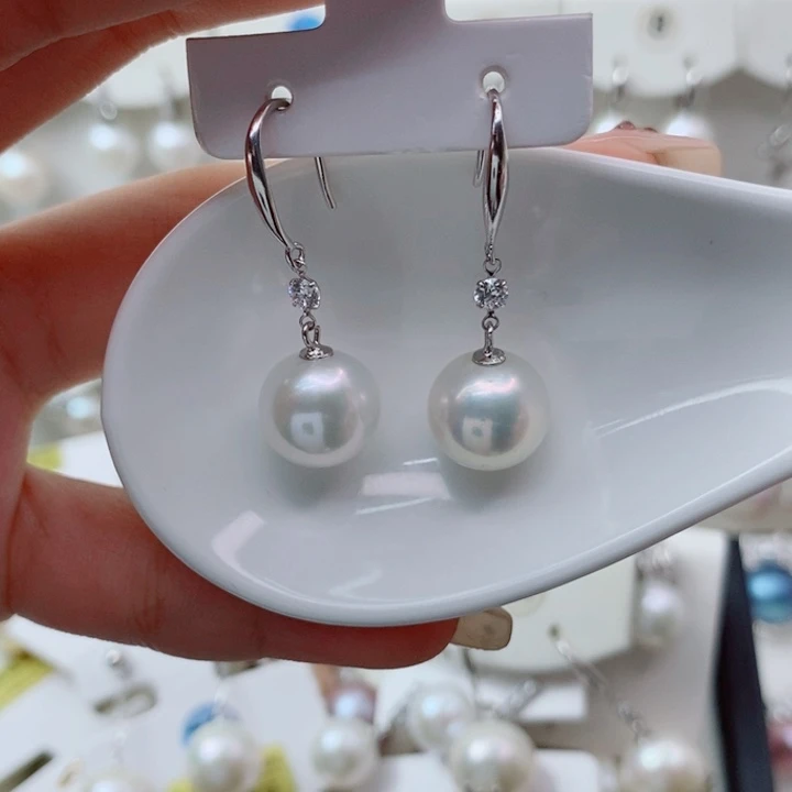 橙***◉淡水珍珠耳饰银S925镶嵌