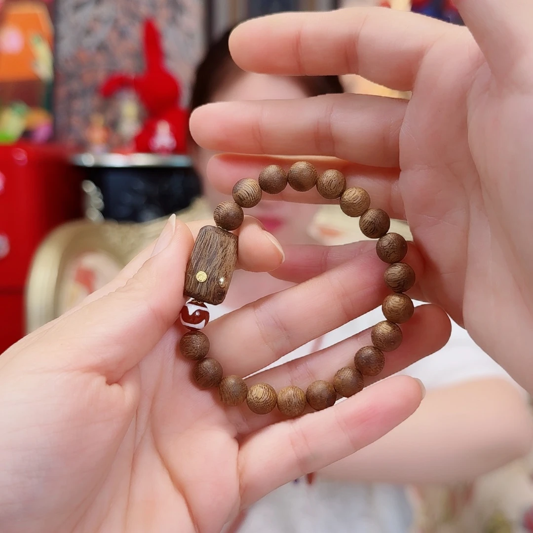 萌***乖檀香木无事牌手串