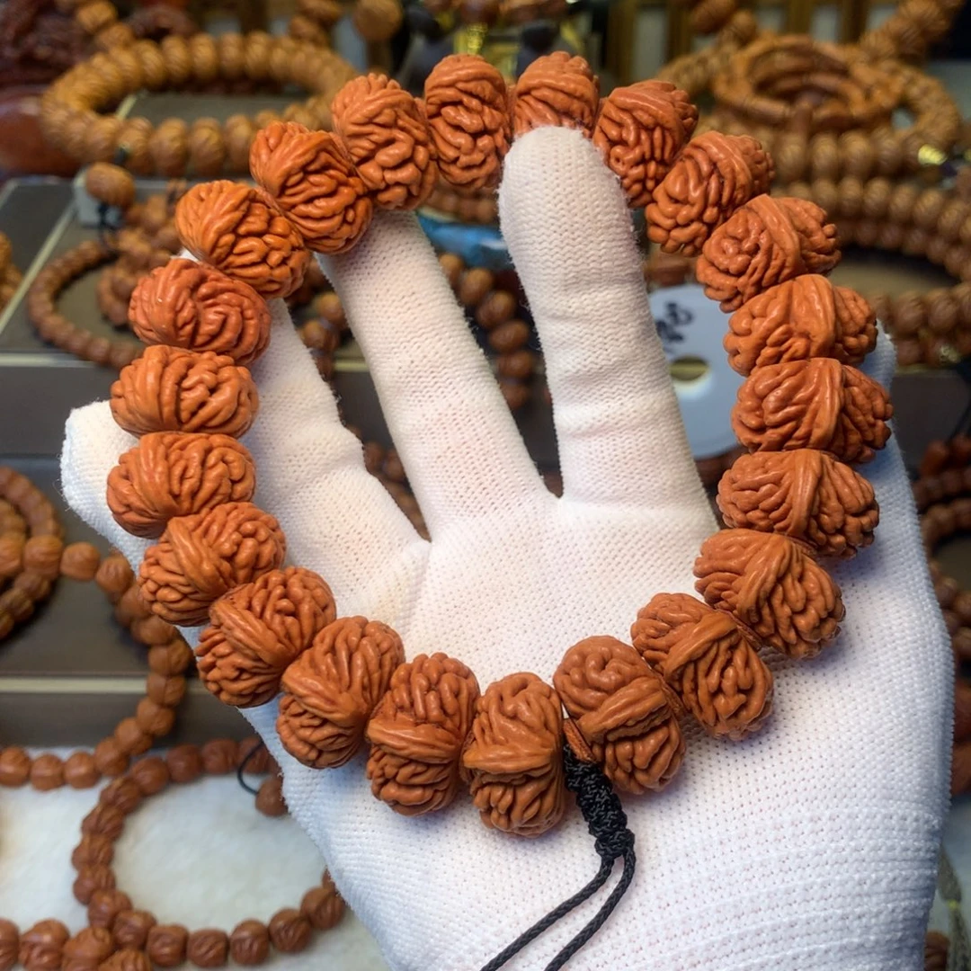 知***饰桃核手串秦岭龙纹