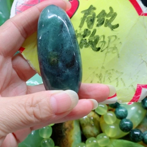 未镶嵌蛇纹石玉手把件